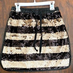 Gianni Bini sequin mini skirt for girls .